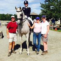 L to R: Father Ernest Lang, Katie and Blueberry, coach Kathy Rowse and mother Cindy Lang